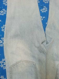 Distressed Light Wash Denim Jeans