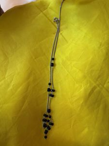 Elegant Silver Necklace with Black Beads