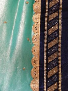 Stunning Teal Saree with Gold Border