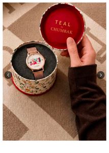 round dial analog hand watch elephant print