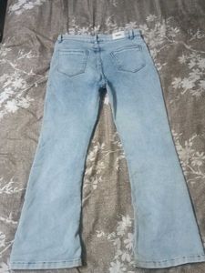 Light wash Boot cut low rise jeans for Women.