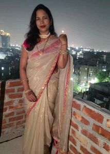 Elegant golden net Saree Wih Stitched Blouse
