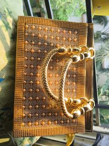 Elegant Gold Embellished Clutch