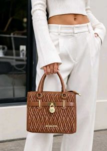 Micheal kors slingbags