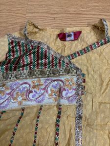 Beautiful Yellow Embroidered Kurta with churidar