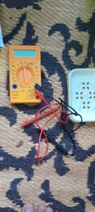 Multimeter And Saban Box And Blothot Bard And Pen And Eear Clener