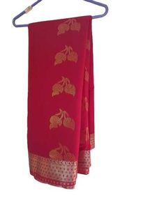 Vibrant Red Saree with Golden Motifs
