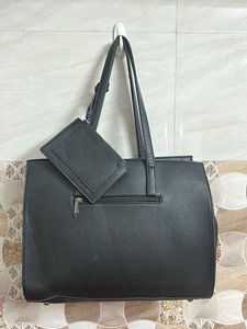 Chic Black Faux Leather Tote Bag with Pouch