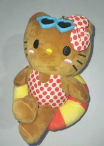 Tanned hello kitty bag charm 🧸