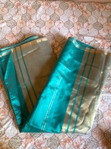 Elegant Teal & Gold Saree