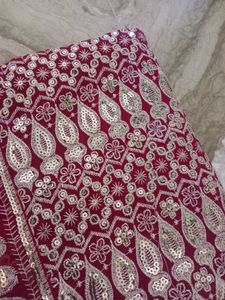 Elegant Maroon Embellished Saree
