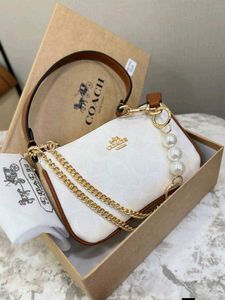 Coach Nolita White with Rust 🧡