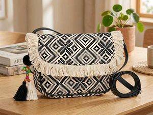 Women Black & Off-White Woven Design sling bag