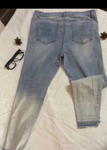 Distressed Light Wash Denim Jeans