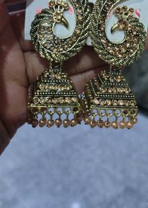 3 earrings or 1 ring