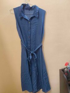 A denim dress sleeveless