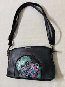 Black Leather Shoulder Bag with Lotus Design
