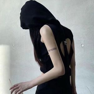 Edgy Black Ribbed Crop Top with Buckle Detail
