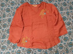 Orange top like kurti with Paisley Embroidery