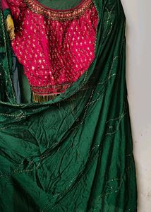 Elegant Green lehanga with Pink Motifs