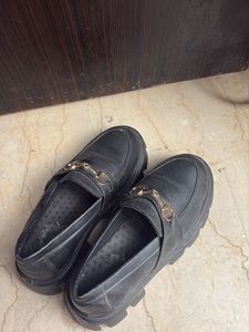 Chic Black Loafers with Gold Buckle