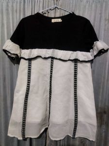 Chic Black & White Ruffle Top