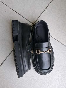 Chic Black Loafers with Gold Buckle