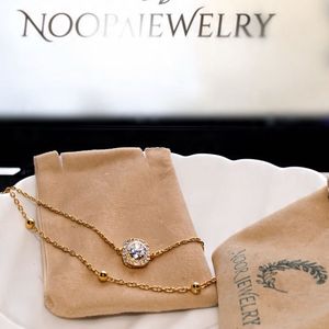Elegant Gold-Tone Bracelet with Crystal