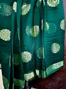Elegant Green Saree with Gold Floral Motifs