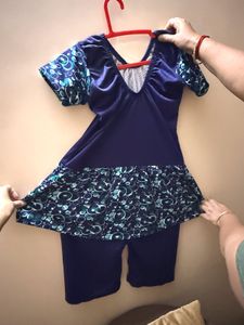 Stylish Blue Swimsuit with Skirt
