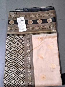 Elegant Beige Saree with Black Border