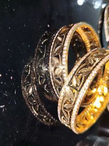 Elegant Gold Leaf Bangles with Diamonds