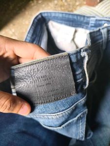 Light Blue Distressed Denim Jeans