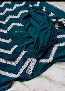 Beautiful Teal Saree with White Embellishments
