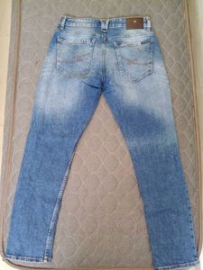 Distressed Blue Denim Jeans of Louis Philippe Jean
