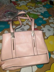 Stylish Pink Handbag with Multiple Compartments