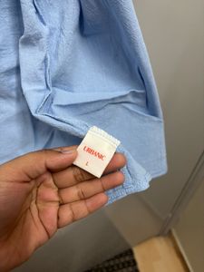 Light Blue Button-Down Shirt with shorts