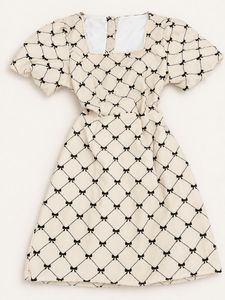 coquette bow-print mini dress| statement back bow