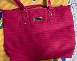 Brand new spacious sidebag or handbag in Rani pink or fusia pink colour