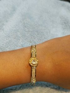 Elegant Gold Tone Bangle Bracelet with CZ Stones