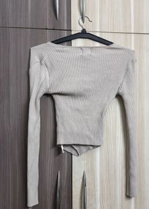 GLOW AND NYMPH Ribbed Wrap Long Sleeve Top