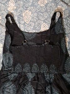 Black dress with blue ethnic print