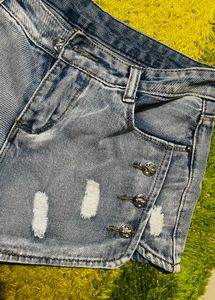 Distressed Denim Shorts with Embellishments
