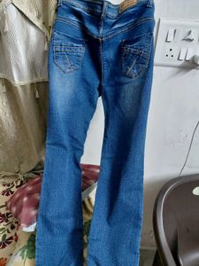 Distressed Blue Denim Jeans