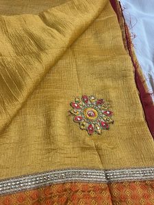Elegant Yellow Saree with Embroidered Border
