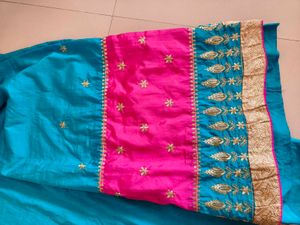 Vibrant Silk Saree with Embroidered Motifs