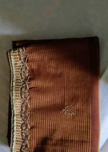 Elegant Brown Striped Saree with Gold Embroidery