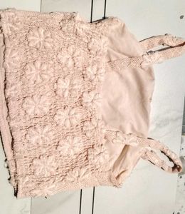 Beige colour a sleeveless patchwork top