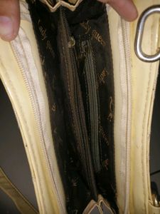 Elegant Cream Quilted Handbag