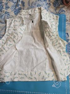 Floral Sleeveless Denim Jacket